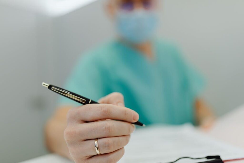 a doctor holding a pen