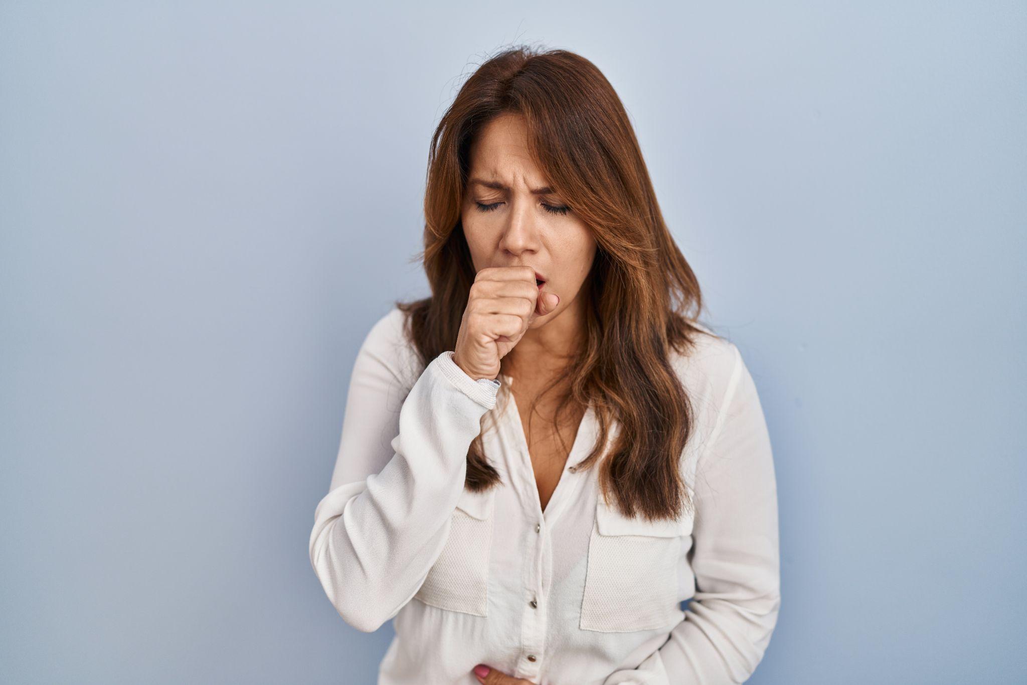 A woman coughing
