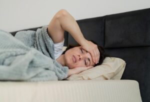 A woman lying in bed. 