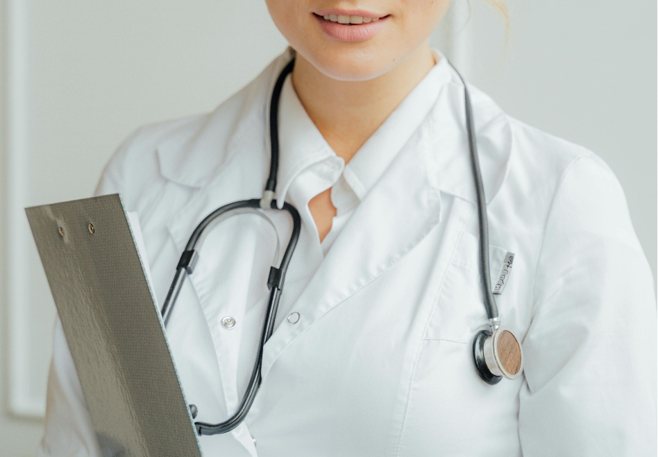 A stethoscope hanging around a doctor’s neck