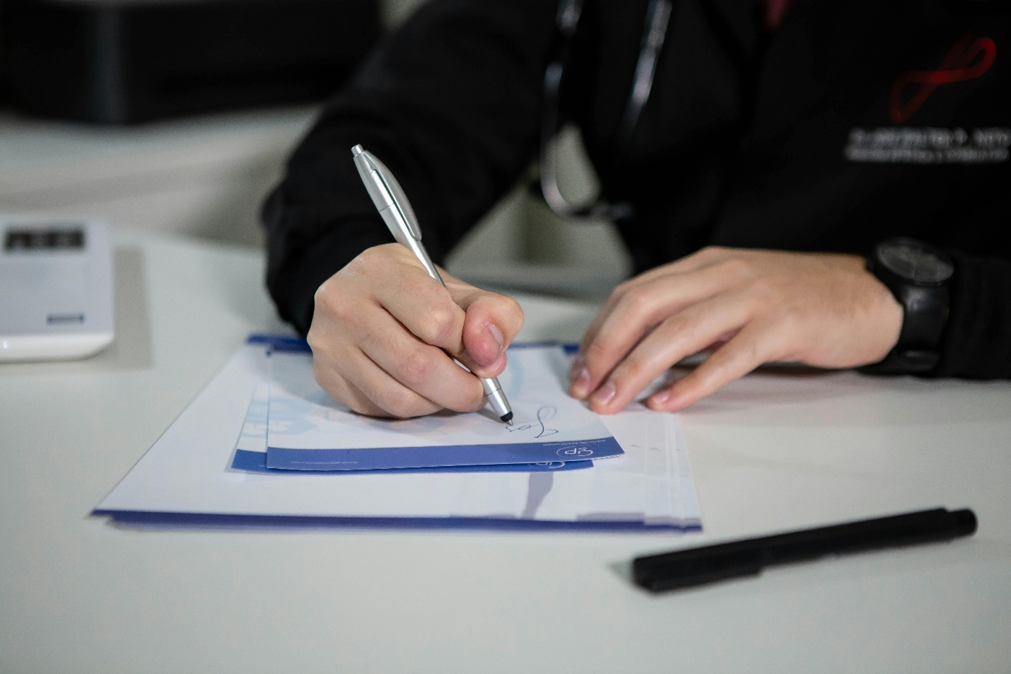 Doctor writing a note
