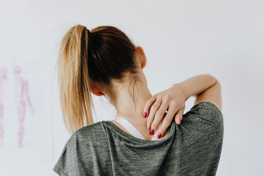 Woman struggling with backache