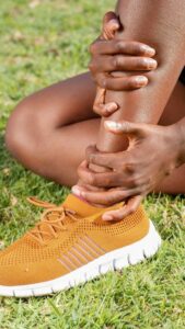 An image of a person with pain in their calf