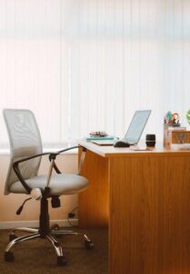 An image of an office desk and chair