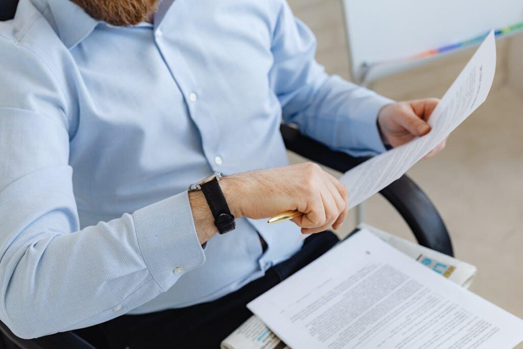 Employee worried after receiving an FMLA rejection letter from HR.