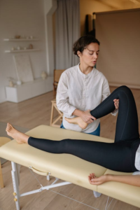 An image of a person getting physiotherapy for a leg injury