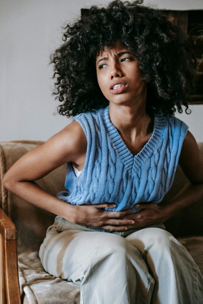 A picture of a person experiencing stomach pain