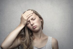 Patient experiencing fever and headache needing a doctor's note for work online