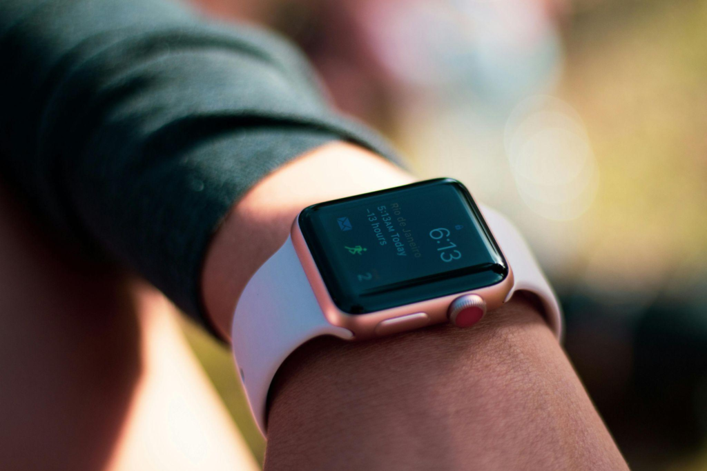 Smartwatch showing health metrics on a person’s wrist.