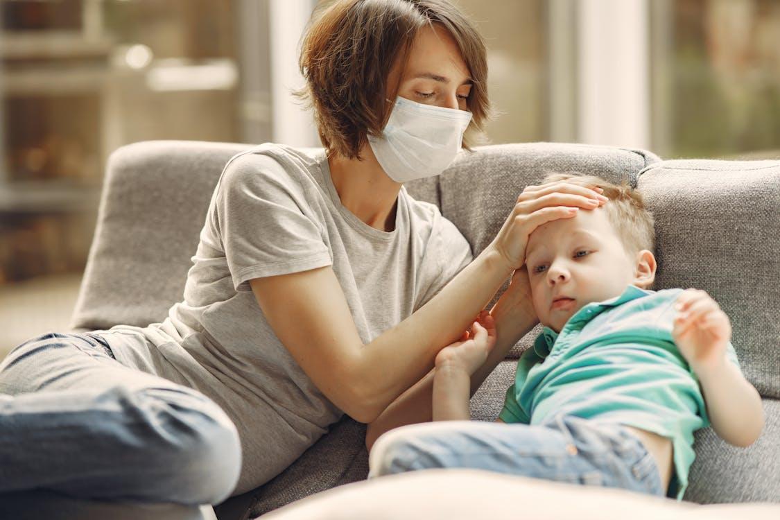 Parent caring for a sick child at home during recovery