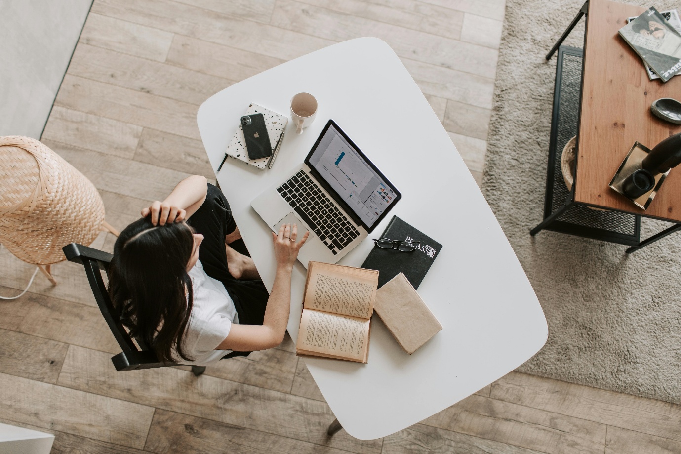 A photo showing a tired woman working from home