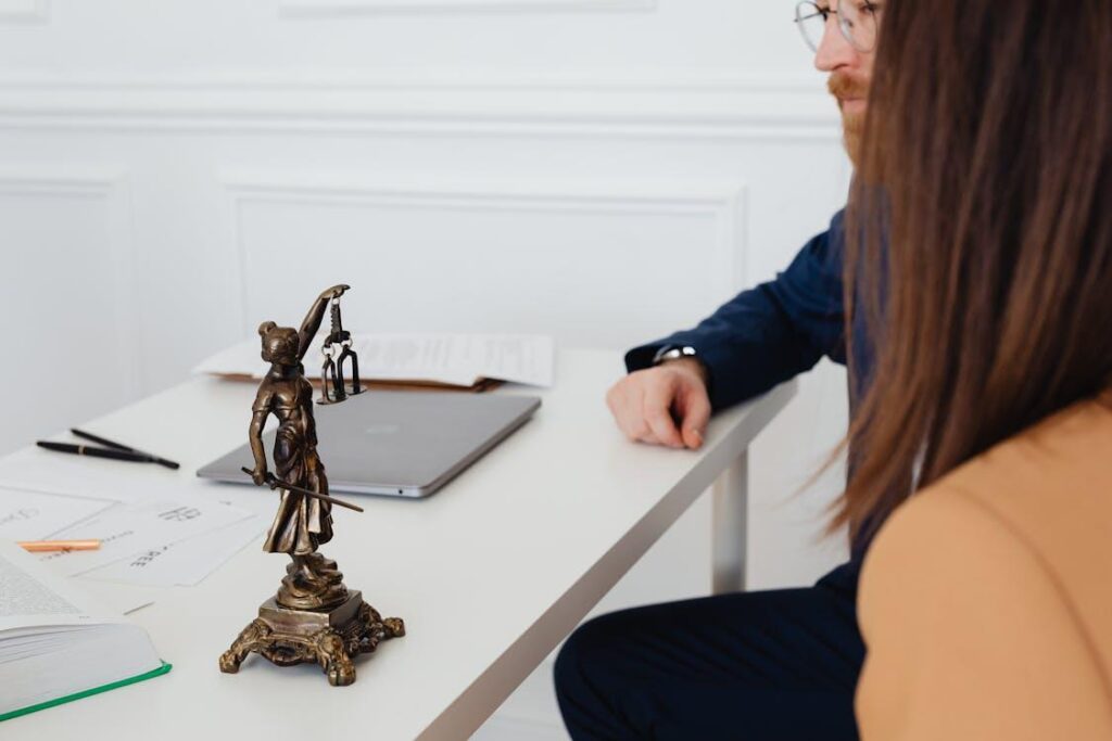 Couple sitting in a lawyer’s office during a consultation