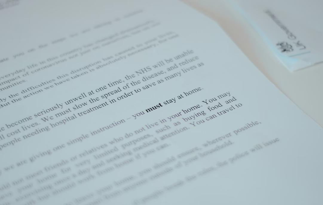 This image shows a formatted document lying on a table.