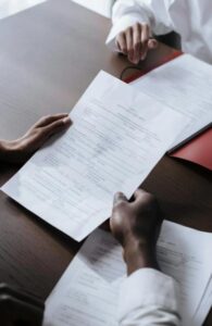 This image shows a person verifying documents.